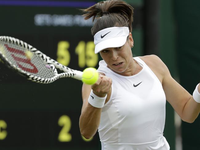 Australia's Ajla Tomljanovic returns to Belarus' Victoria Azarenka in a Women's singles match during day three of the Wimbledon Tennis Championships in London, Wednesday, July 3, 2019. (AP Photo/Ben Curtis)