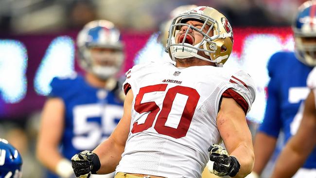 Chris Borland #50 of the San Francisco 49ers celebrates after a tackle.