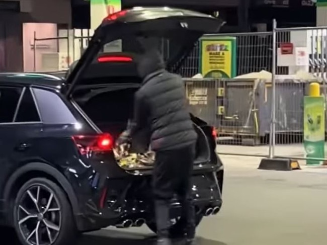 A gang of masked teens have been filmed during an alleged armed robbery at a Melbourne service station. Picture: Instagram/kiwiaussieproud