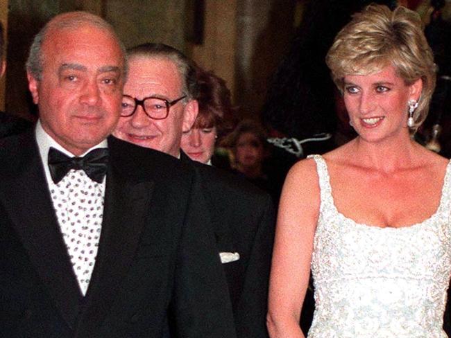 Princess Diana with Mohammed Al Fayed attending a charity dinner for the Harefield Heart Unit held at Harrods, London, February 1996. Diana wears a pale blue Catherine Walker dress. (Photo by Jayne Fincher/Getty Images)