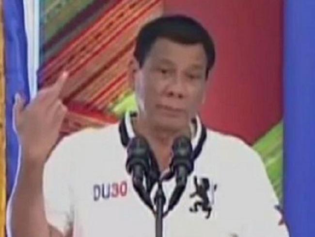 Philippine President Rodrigo Duterte makes a rude gesture to media. Picture: Al Jazeera grab