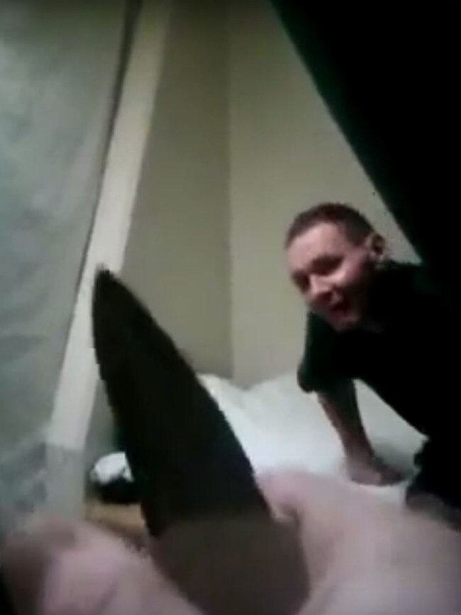 Stills taken from a video posted of a prisoner who claims he is in Parklea prison with items like a knife, a razor and drugs. Source: YouTube