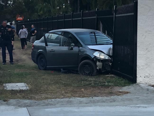 The car which ploughed into the fence of a Townsville church.