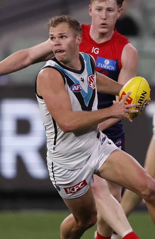 Melbourne is in the hunt for Power defender Dan Houston. Picture: Darrian Traynor/AFL Photos/via Getty Images.