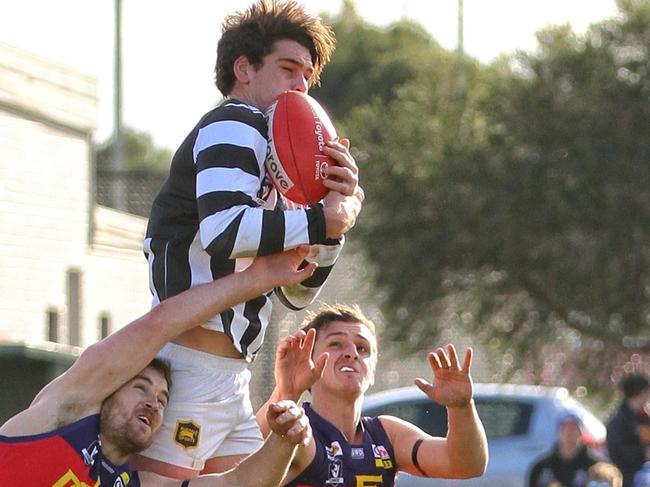 Nathan Fowler flies high against Diggers Rest. Picture: Aaron Cook