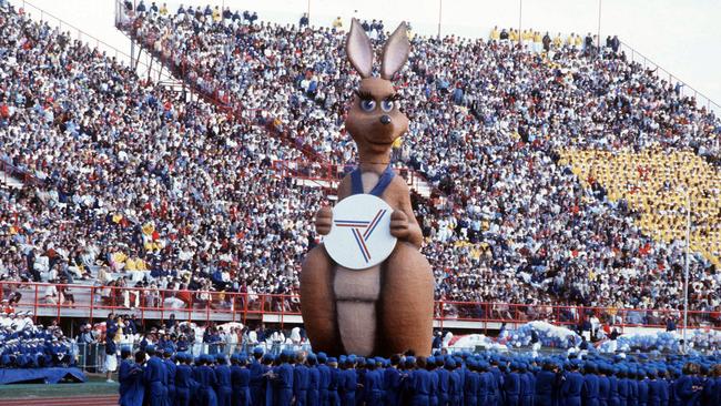 Brisbane's Commonwealth Games mascot Matilda the kangaroo glides around the track at the opening ceremony at QEII stadium in 1982. Picture: The Courier-Mail Photo Archive