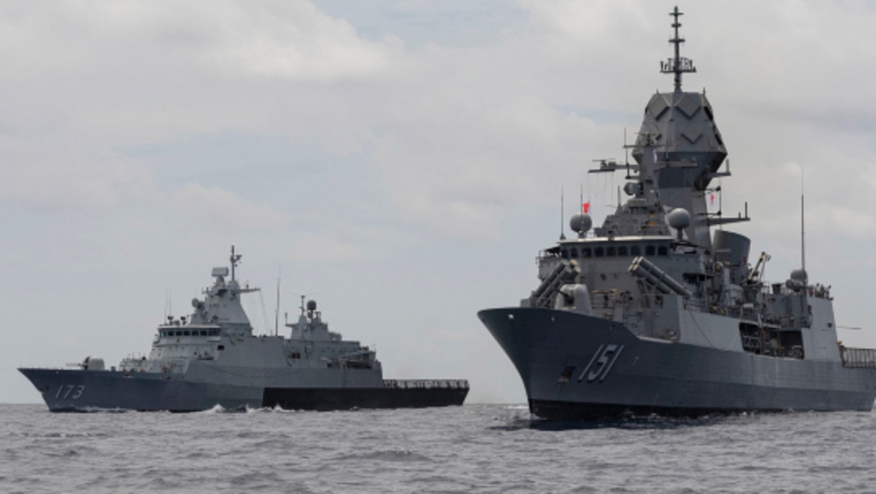 HMAS Arunta conducts Officer of the Watch manoeuvres with KD Perak during a Passage Exercise with the Royal Malaysian Navy as part of an East Asia Deployment.