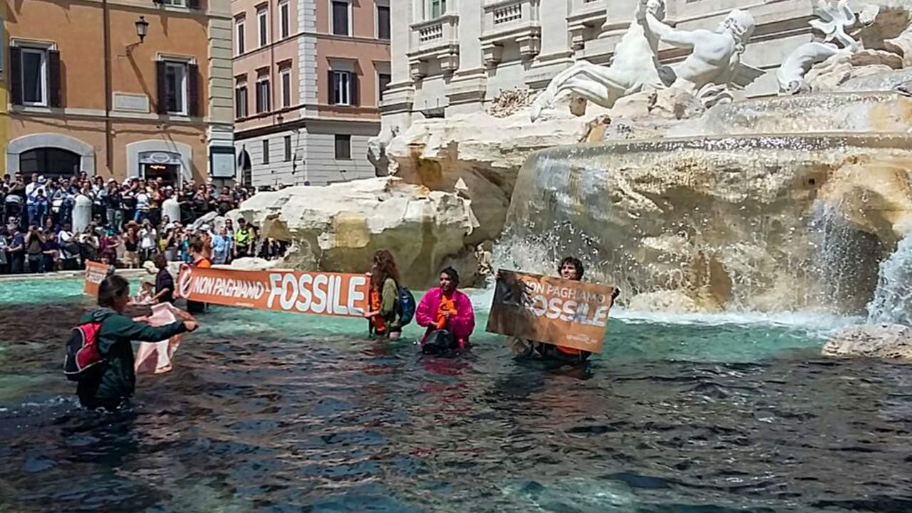 Protesters in Italy turned the Trevi Fountain’s water black. Picture: Last Generation/AFP