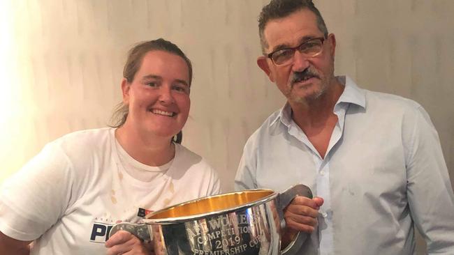 Perkins and her dad Ken with the 2019 AFLW premiership cup. Picture: Supplied