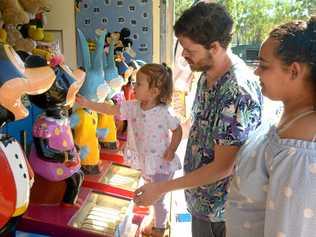Brailynn Donald, Keedon Donald-Passmore and Thea Hayes at the Mt Morgan Show arcade. Picture: Jann Houley