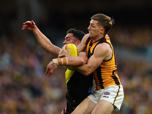 Several tackles over the weekend, including one from Hawk Dylan Moore, caused confusion over dangerous head-high contact. Picture: Graham Denholm/Getty Images.