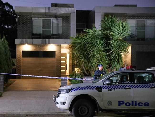 Police outside Ms Fadlallah’s rental townhouse in Panania where she was shot. Picture: Damian Shaw