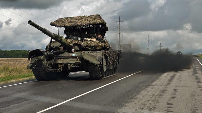 A Russian battle tank T-72 drives outside the town of Sudzha on August 8. Ukraine's incursion into Russia, appears to be an unprecedented assault which experts say could aim to draw Russian resources away from other areas or to undermine morale. Picture: AFP