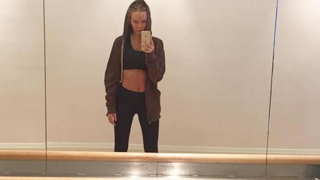 Lara Bingle shares her post baby body as fans praise her workouts ...