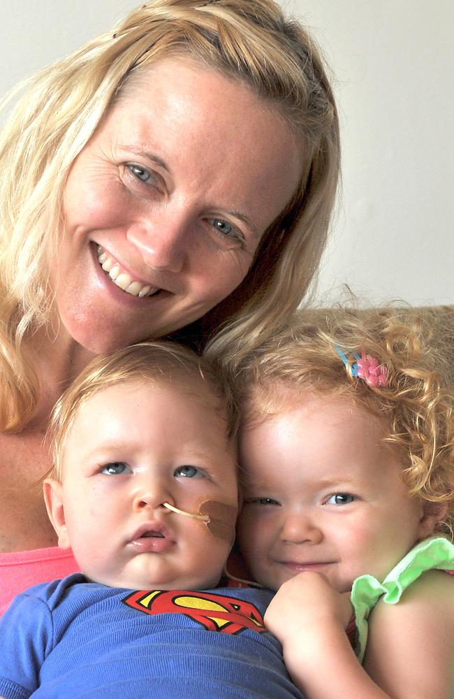 Roki at six months, with sister Ruby and mum Ina.