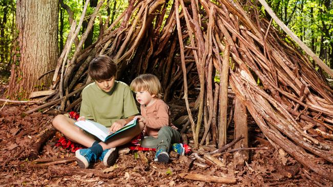 A teepee of branches creates a room all their own.