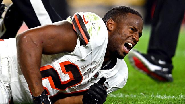 Nick Chubb screams out in pain. (Photo by Joe Sargent / GETTY IMAGES NORTH AMERICA)