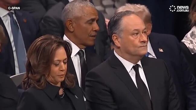 Obama laughs at Trump joke - as Kamala watches on