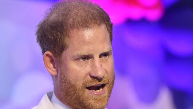 Britain's Prince Harry, Duke of Sussex, gives a speech as he attends a Sit Out with Britain's Meghan (unseen), Duchess of Sussex, at the Nigerian Defence Headquarters in Abuja on May 11, 2024 as they visit Nigeria as part of celebrations of Invictus Games anniversary. (Photo by Kola SULAIMON / AFP)