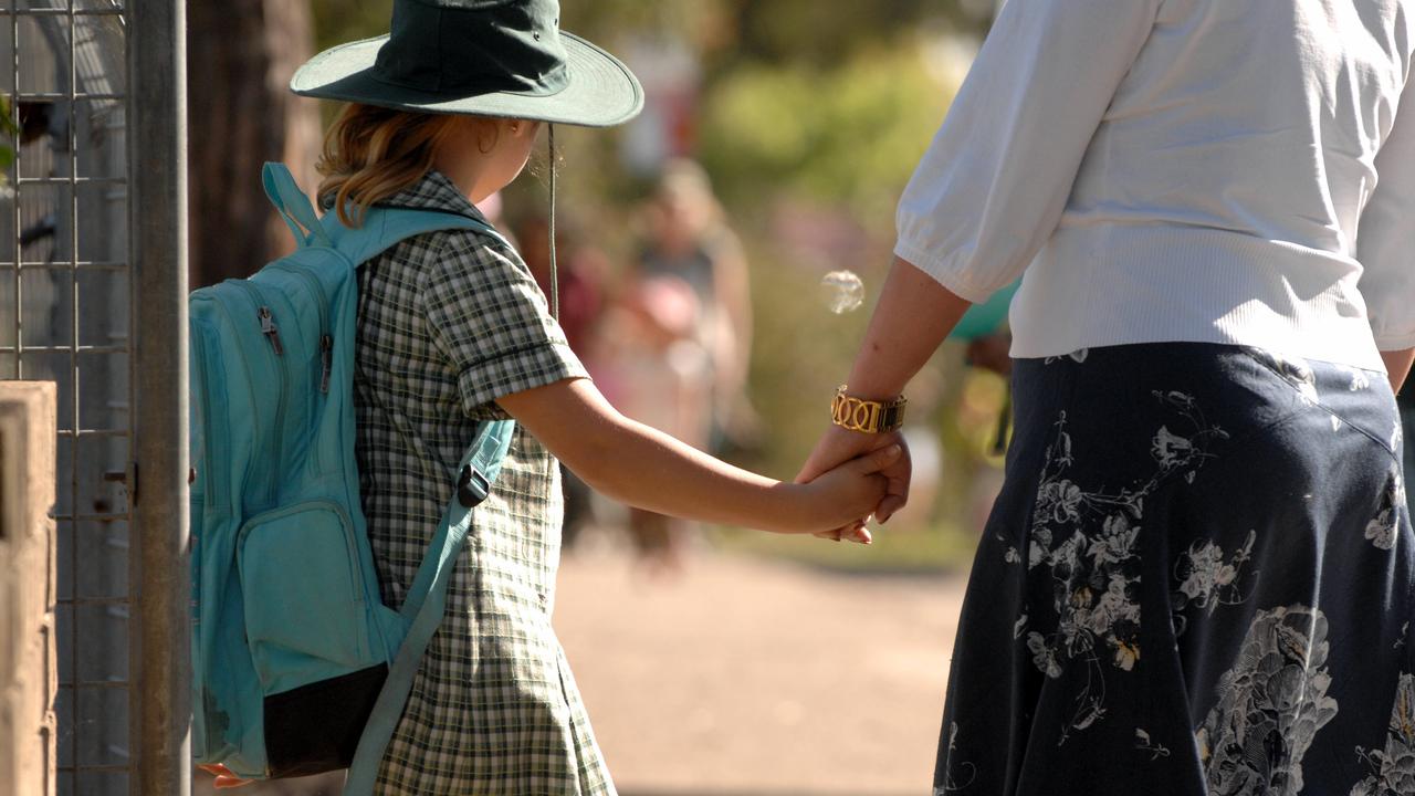 FILE PHOTO: Generic image of school student and mother.