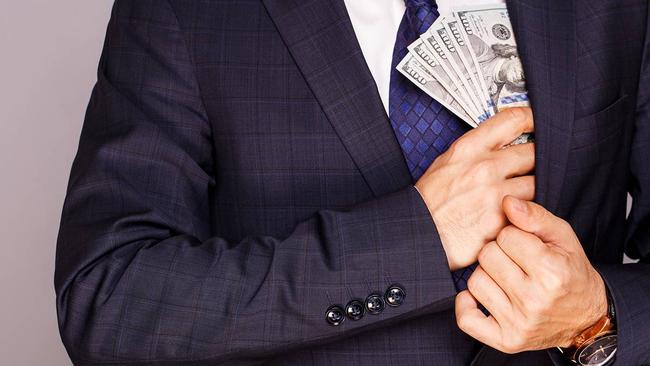 ASX investors have cashed-in on ASX banking stocks, driving the bourse lower. Pic: Getty Images