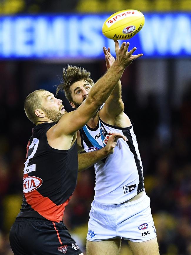 Justin Westhoff goes up against Tom Bellchambers in the ruck on Sunday. Picture: Mark Brake/Getty Images