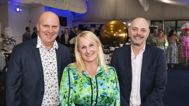 At the Emergency Services race day are (from left) Michael Thiesfield, Kirsty Thiesfield and Grant Spooner at Clifford Park, Saturday, August 10, 2024. Picture: Kevin Farmer