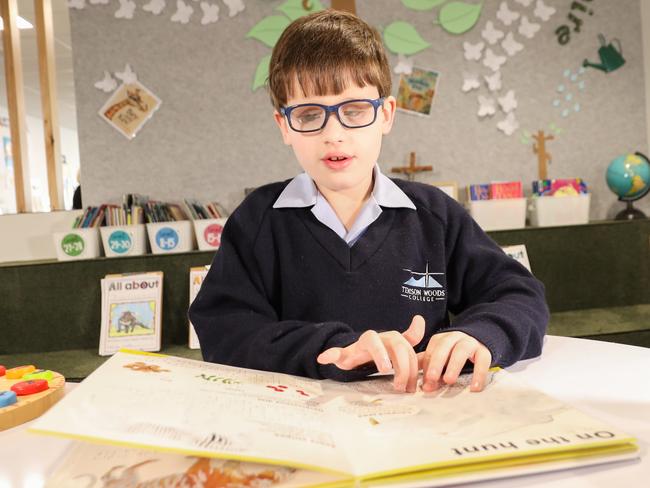 Declan enjoys reading books in braille – but his favourite pastime is playing music on the drums or the piano. Picture: supplied