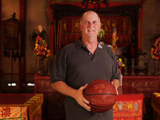 Olympian and legendary basketball player Phil Smyth, stands with a Chinese lion which brings good luck and wards off evil spirits. China has recently agreed to take part in the Arafura Games which will take place in Darwin. Pictured at the Chung Wah Temple in Darwin. Picture: Keri Megelus