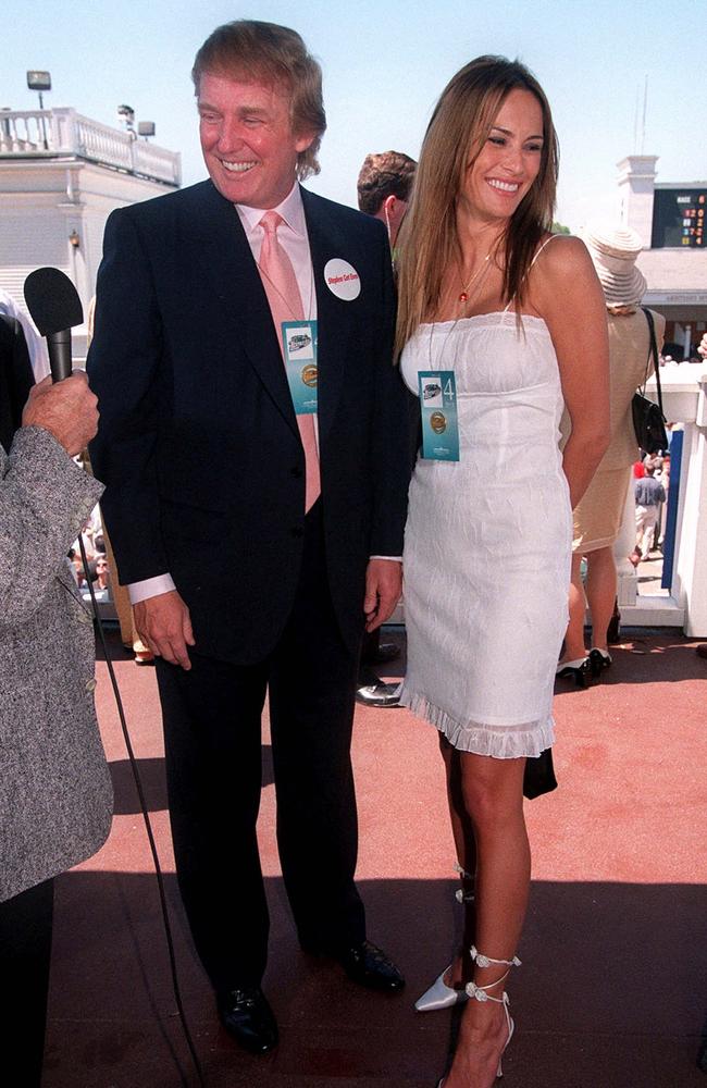 Donald Trump and Melania pictured on May 1, 1999 in the early stages of their relationship at Churchill Downs in Louisville, Kentucky for 125th Kentucky Derby.