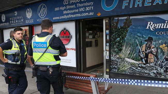 Police outside O'Reillys Firearms in Thornbury after it was held up. Picture: Ian Currie