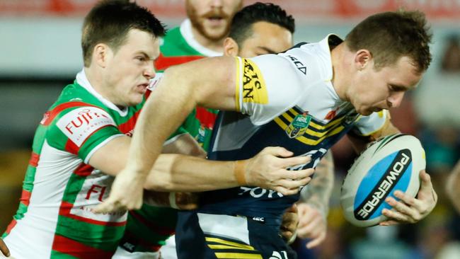 Michael Morgan is tackled by Rabbitoh Luke Keary.