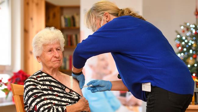 Helga Klingseisen, resident of the Curanum senior citizens' home, receives the vaccination from Katja Ruppert in Gemering, Germany. Picture: Getty Images