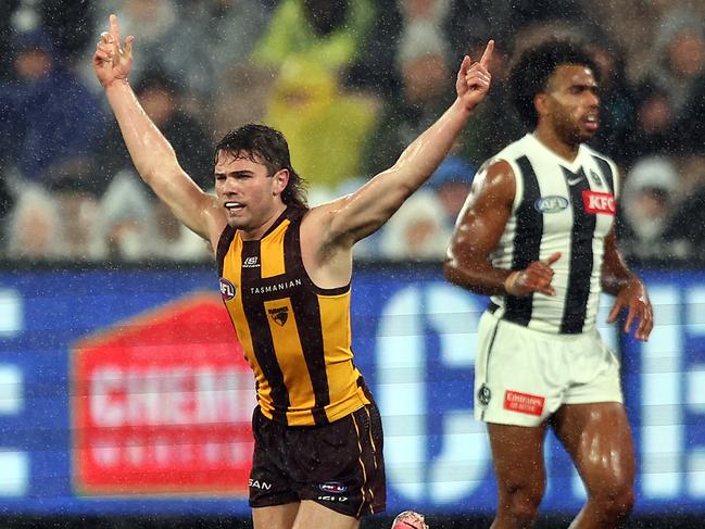 MELBOURNE, AUSTRALIA - JULY 20: Nick Watson of the Hawks (L) celebrates kicking a goal during the round 19 AFL match between Hawthorn Hawks and Collingwood Magpies at Melbourne Cricket Ground on July 20, 2024 in Melbourne, Australia. (Photo by Graham Denholm/AFL Photos/via Getty Images)