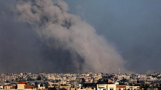 A picture taken from Rafah shows smoke billowing over Khan Younis in the southern Gaza Strip during Israeli bombardment on Saturday. Picture: AFP