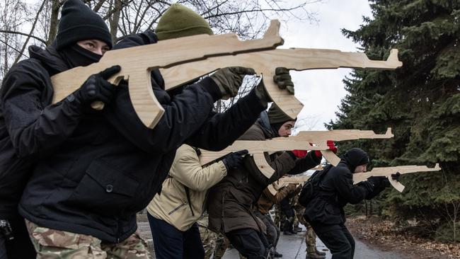 Civilians take part in a military training course by a Christian Territorial Defence Unit in Kyiv on Saturday. Picture: Getty Images