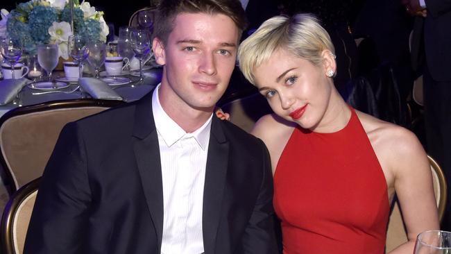 Miley and Patrick were relaxed and happy to pose for pics together.