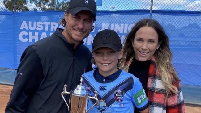 Cruz Hewitt with his trophy and parents Lleyton and Bec. Picture: Instagram