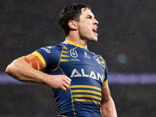 Mitchell Moses celebrates kicking the sideline conversion that won the game. Picture: Mark Kolbe/Getty Images