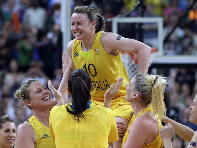 11/08/2012 WIRE: Australia's Kristi Harrower (10) is lifted by teammates after they defeated Russia in a women's bronze medal basketball game at the 2012 Summer Olympics, Saturday, Aug. 11, 2012, in London. (AP Photo/Eric Gay) Pic. Ap