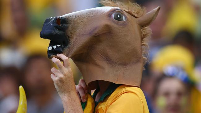 Surely not the best headgear for watching the action.