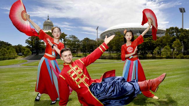 SLAVA Ukrainian Cultural Centre dancer Diniz Miziev with Adelaide Chinese Dance Academy dancers Yuanyuan, 13, and Yuana, 9, will perform in Rundle Mall as part of this year’s Australia Day program, which will run across seven days. Picture: Naomi Jellicoe