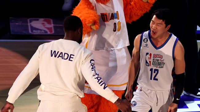 Actor Simu Liu with Dwyane Wade at the NBA Celebrity All-Star game. (Photo by Tim Nwachukwu/Getty Images)