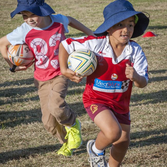 Taufa Taulani, right, as a young student at Mango Hill State School. Pictures by Russell Brown.
