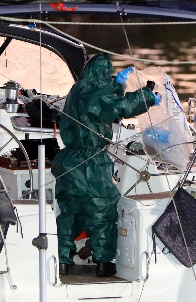 Police on board the yacht on Saturday. Picture: Damian Shaw