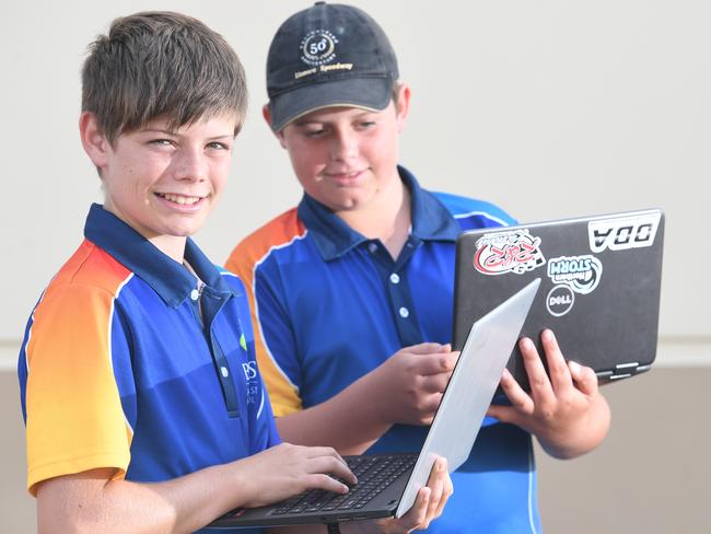 Mark Stranger, of Ballina, is very proud of his two boys Reece, 13, (cap) and Daykin, 14, who go to Ballina Coast High School and performed well in this year's NAPLAN.