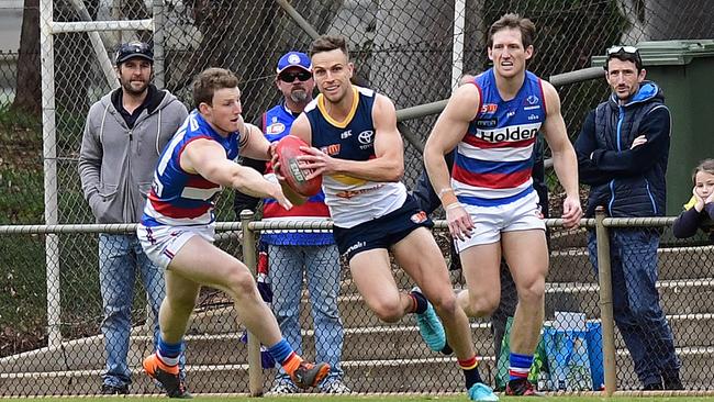 Adelaide's Brodie Smith dashes from defence against Central District in the SANFL. Picture: Tom Huntley