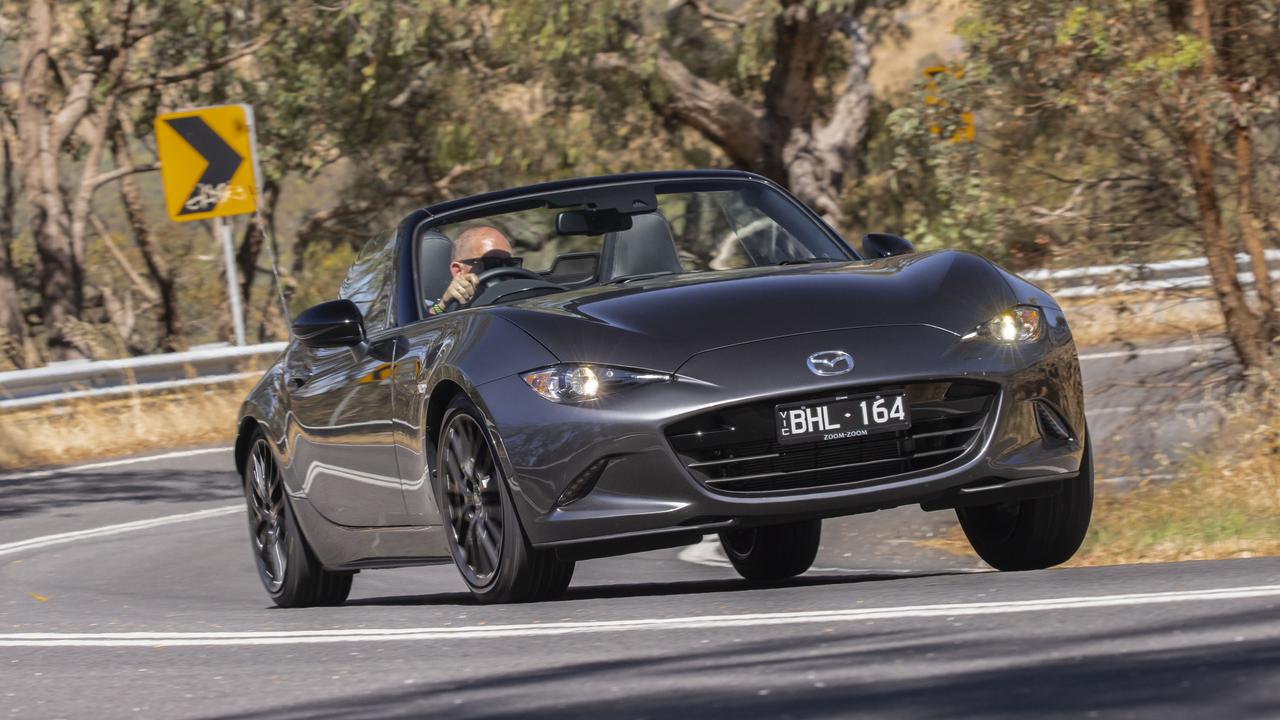 Even with firmer suspension, the MX-5 still rolls far more than most sports cars.