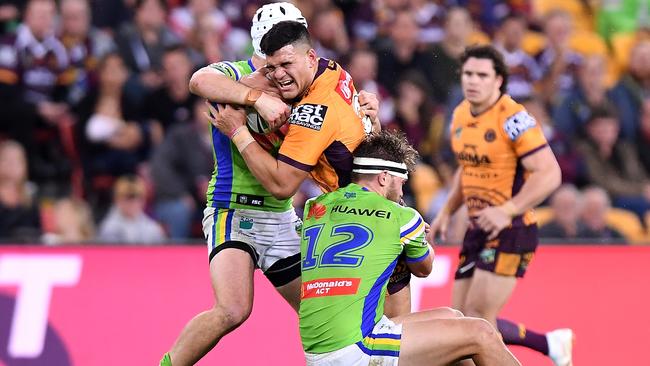 David Fifita of the Broncos is tackled on debut for the Broncos against Canberra. Photo: Getty Images