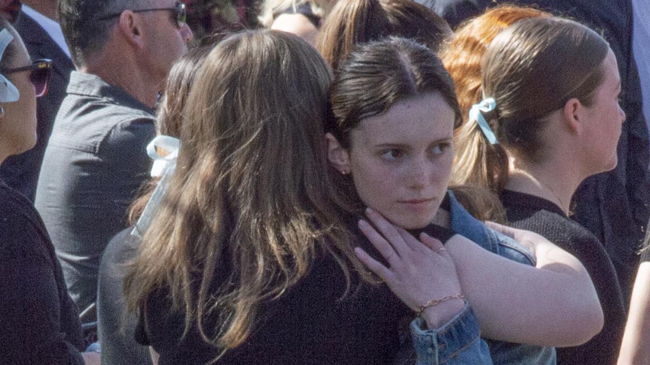 Emotional scenes as mourners embrace. Picture: NCA NewsWire / Monique Harmer